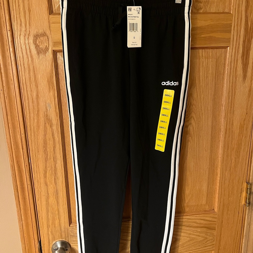 Adidas Black Joggers with Iconic Stripes